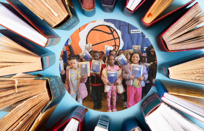  Students standing with books in their hands. surrounded by books.